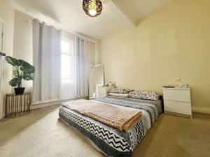 Bedroom One- click for photo gallery